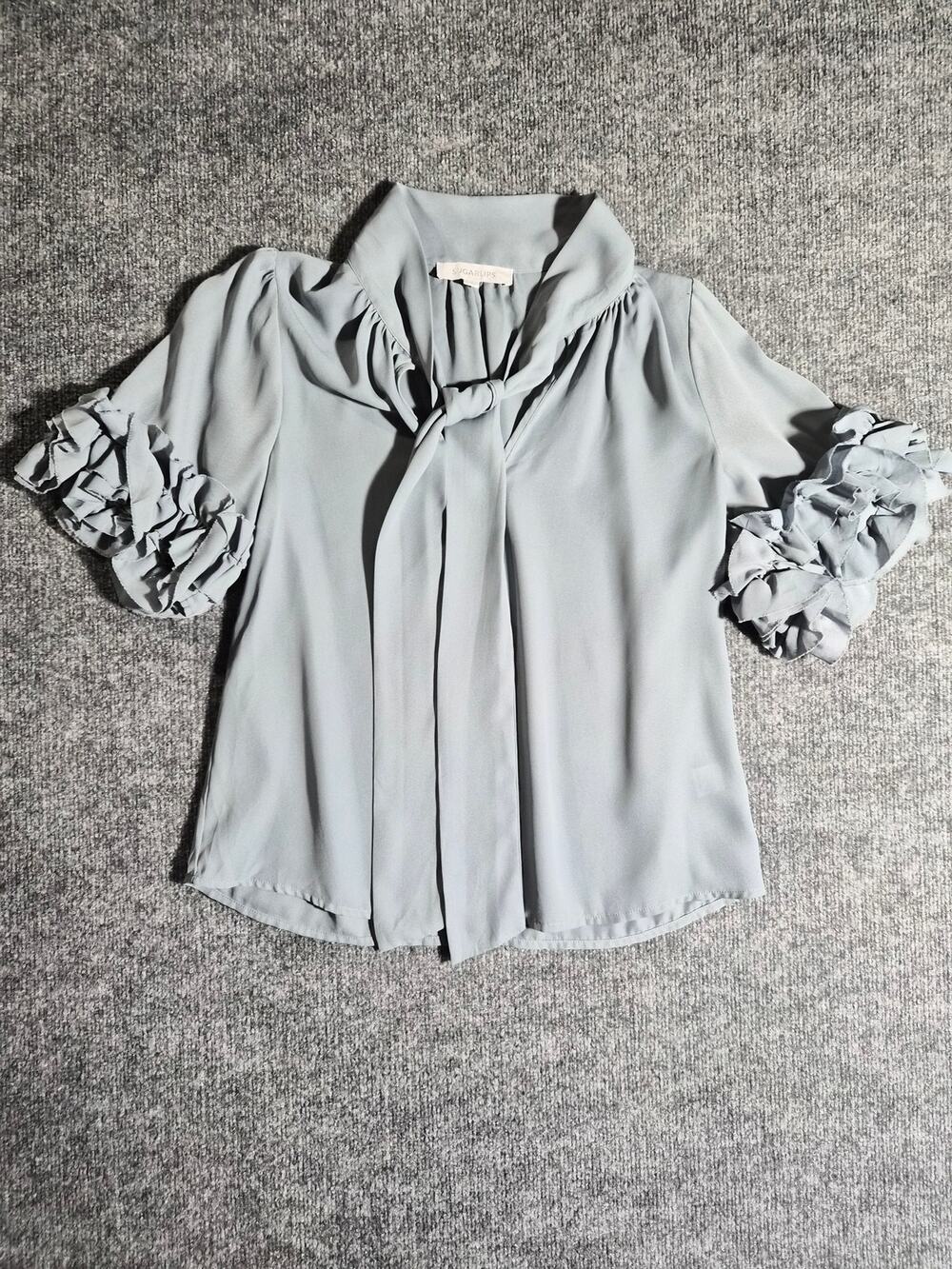 Sugarlips Women’s Blouse Size Small Dusty Blue Tie Neck Ruffle Sleeve Top